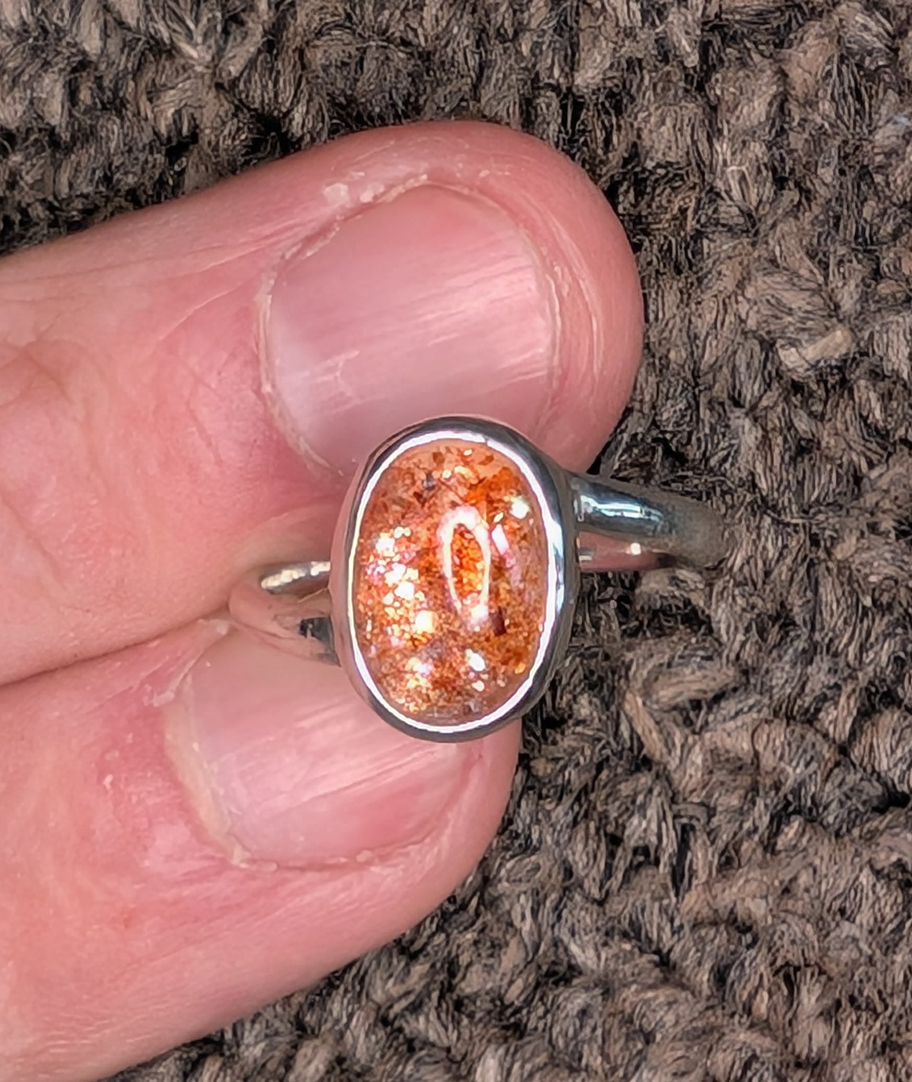 Sunstone & 925 Silver Ring - Sunstone catches the light and keep it close with this glowing Sunstone ring, bezel-set in solid 925 sterling silver. With its fiery flecks and subtle shimmer, Sunstone is often associated with joy, self-empowerment, and warmth. This handcrafted ring balances modern simplicity with the natural sparkle of the stone — perfect for everyday magic.